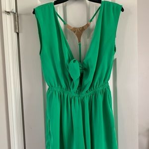 Green romper with gold metallic back detail